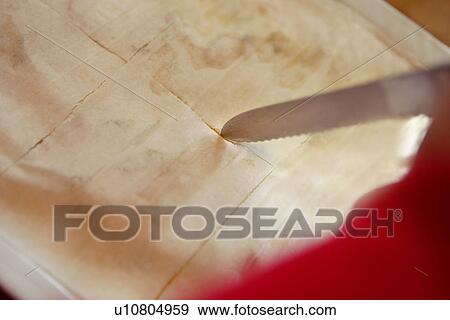 Stock Photo - Cutting Filo Pastry. Fotosearch