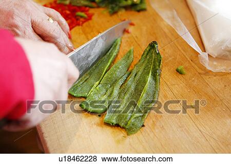 Cutting Green Peppers View Large Photo Image Stock Photo - Cutting Green Peppers. Fotosearch