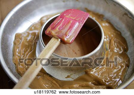 Stock Image - Dulce de Leche in baking pan. Fotosearch