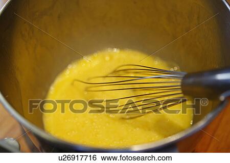 Stock Photograph - Egg with Whisk / step shot. Fotosearch
