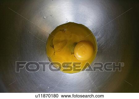 Stock Image - Egg Yolk in dish. Fotosearch