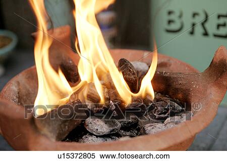 Fire and Coals in Tagine View Large Photo Image Stock Photography - Fire and Coals in Tagine. Fotosearch