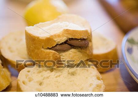 Stock Image - French Bread Slice with Chocolate Rounds. Fotosearch