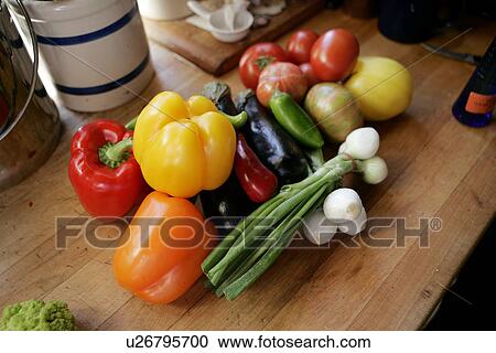 Fresh Peppers and Vegetables on the Kitchen Counter View Large Photo Image Stock Image - Fresh Peppers and Vegetables on the Kitchen Counter. Fotosearch