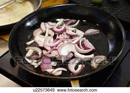 Frying Red Onion in Pan View Large Photo Image Stock Photo - Frying Red Onion in Pan. Fotosearch