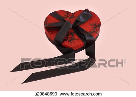 Stock Image - Heart Shaped Box of Chocolates. Fotosearch