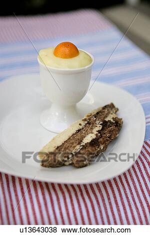 Lemon Mousse Egg and chocolate streaky strips View Large Photo Image Stock Photo - Lemon Mousse Egg and chocolate streaky strips. Fotosearch