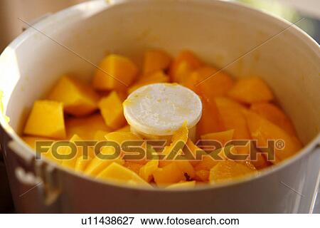 Mango Pieces in a food processor View Large Photo Image Stock Photo - Mango Pieces in a food processor. Fotosearch