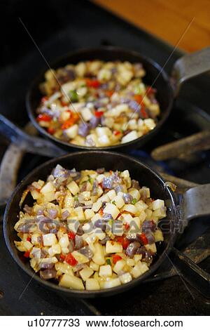 Mini Skillet with Potato and Onion View Large Photo Image Stock Image - Mini Skillet with Potato and Onion. Fotosearch