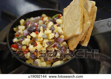 Mini Toast, onions and potatoes View Large Photo Image Picture - Mini Toast, onions and potatoes. Fotosearch