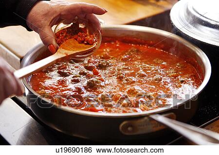 Stock Photograph - Moroccan Kefta in a pan. Fotosearch