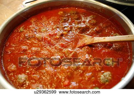 Stock Photo - Moroccan Kefta in pan. Fotosearch