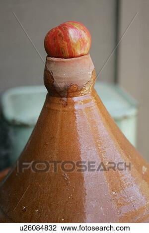 Moroccan Tajine Dish with an apple View Large Photo Image Stock Image - Moroccan Tajine Dish with an apple. Fotosearch