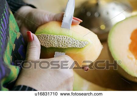 Peeling a Cantaloupe Melon View Large Photo Image Stock Image - Peeling a Cantaloupe Melon. Fotosearch