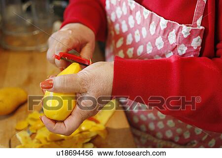 Peeling a Mango View Large Photo Image Stock Photograph - Peeling a Mango. Fotosearch