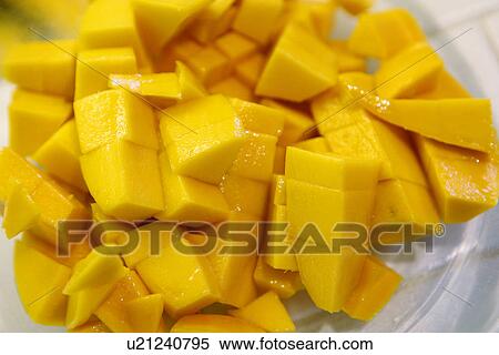 Stock Photography - Pieces of Mango. Fotosearch