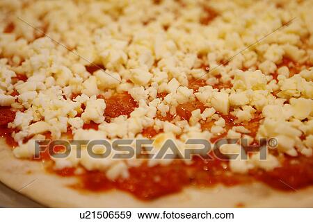 Pizza base with tomato and cheese View Large Photo Image Stock Photo - Pizza base with tomato and cheese. Fotosearch