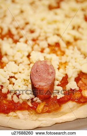Pizza base with Tomato, Cheese and sausage View Large Photo Image Stock Image - Pizza base with Tomato, Cheese and sausage. Fotosearch