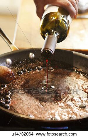 Pouring Pinot Noir into Pan /Step shot View Large Photo Image Picture - Pouring Pinot Noir into Pan /Step shot. Fotosearch