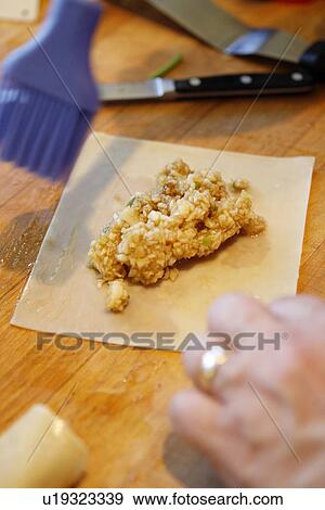 Preparing Apple Egg roll View Large Photo Image Stock Photo - Preparing Apple Egg roll. Fotosearch