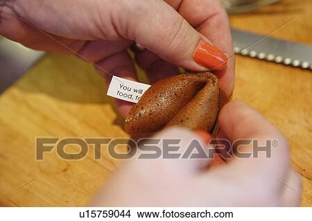 Picture - Preparing Chocolate Fortune Cookies / Step shot. Fotosearch