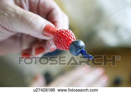 Stock Photograph - Raspberry and Blueberry on cocktail stick. Fotosearch