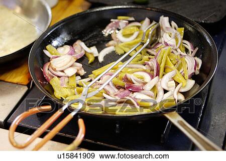 Stock Photo - Red Onions and Chili in Pan. Fotosearch