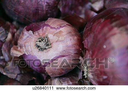 Stock Image - Red Onions and Farmers Market. Fotosearch