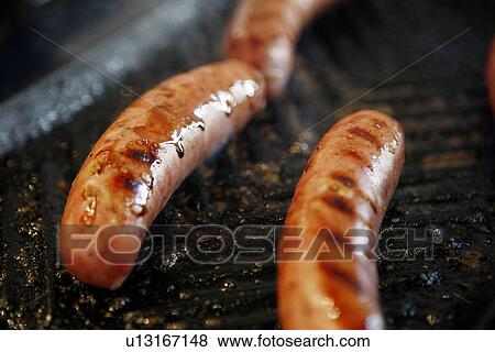 Sausages on Griddle Pan View Large Photo Image Stock Photo - Sausages on Griddle Pan. Fotosearch