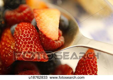 Stock Image - Strawberries and Spoon. Fotosearch