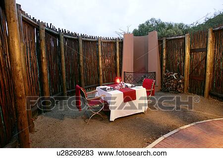 Stock Image - Table for two, Thanda Private Game Reserve. Fotosearch