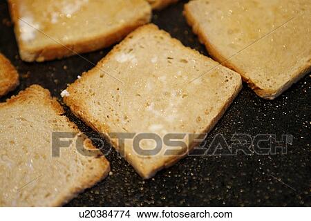 Toast with Butter View Large Photo Image Picture - Toast with Butter. Fotosearch