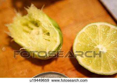 Two Lemon Halves, one used View Large Photo Image Stock Photo - Two Lemon Halves, one used. Fotosearch