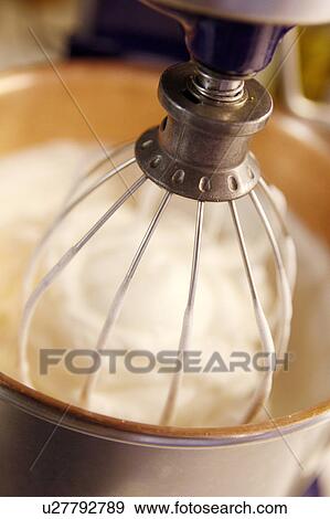 Stock Photo - Whisking Cream / Step shot. Fotosearch