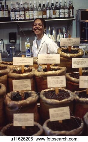 Woman selling coffee beans View Large Photo Image Stock Photography - Woman selling coffee beans. Fotosearch
