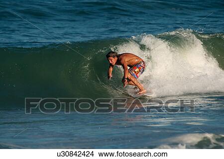 beach surfing little island recreation park beach View Large Photo Image Picture - beach surfing little island recreation park beach. Fotosearch