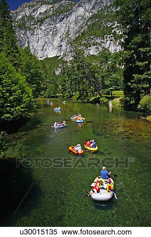 family water tubing down merced river yosemite View Large Photo Image Stock Photography - family water tubing down merced river yosemite . Fotosearch