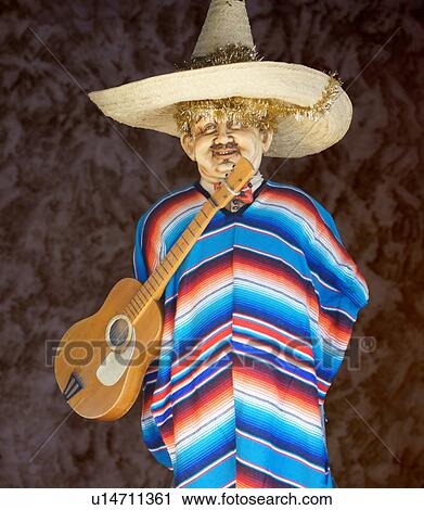 Stock Image -  man mexican hispanic male statue sombrero guitar . Fotosearch