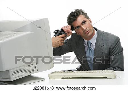 stock photo gun to head from computer