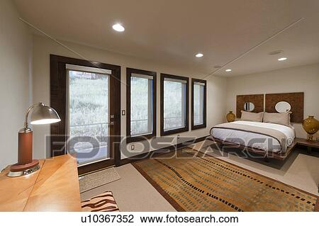 Stock Image - Bedroom of a luxury mansion. Fotosearch
