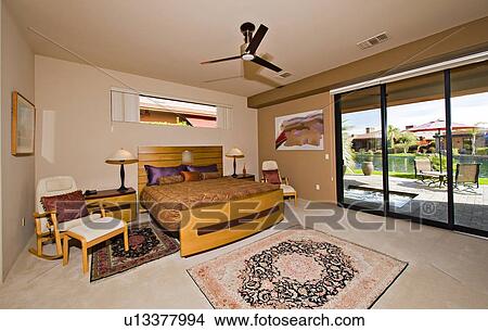 Bedroom with sliding door in manor house View Large Photo Image Picture - Bedroom with sliding door in manor house. Fotosearch