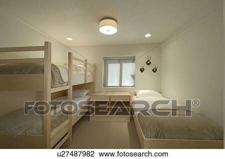Bunk bed in bedroom of mansion View Large Photo Image Stock Image - Bunk bed in bedroom of mansion. Fotosearch