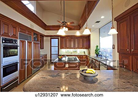 Contemporary kitchen in luxury house View Large Photo Image Stock Photo - Contemporary kitchen in luxury house. Fotosearch