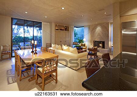 Stock Image - Dining table and chair in living room of luxury manor house. Fotosearch