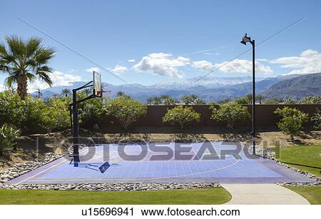 Empty basketball court with light pole View Large Photo Image Stock Image - Empty basketball court with light pole. Fotosearch