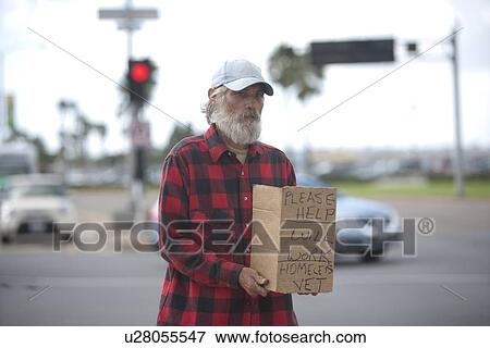 Homeless person with sign on street View Large Photo Image Stock Photo - Homeless person with sign on street. Fotosearch