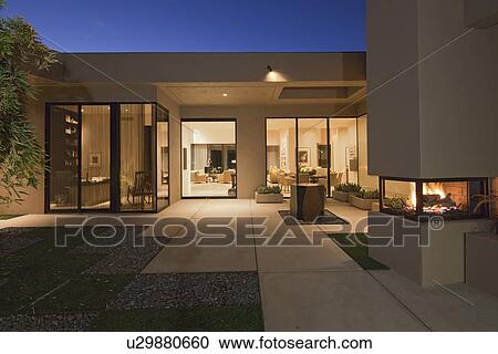 Stock Image - Luxurious villa in evening. Fotosearch