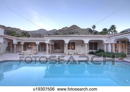 Luxurious villa with swimming pool View Large Photo Image Stock Photograph - Luxurious villa with swimming pool. Fotosearch