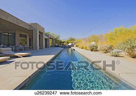Patio of manor house with small pool and chaise lounges View Large Photo Image Stock Photo - Patio of manor house with small pool and chaise lounges. Fotosearch