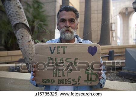 Portrait of homeless man with placard View Large Photo Image Stock Photography - Portrait of homeless man with placard. Fotosearch